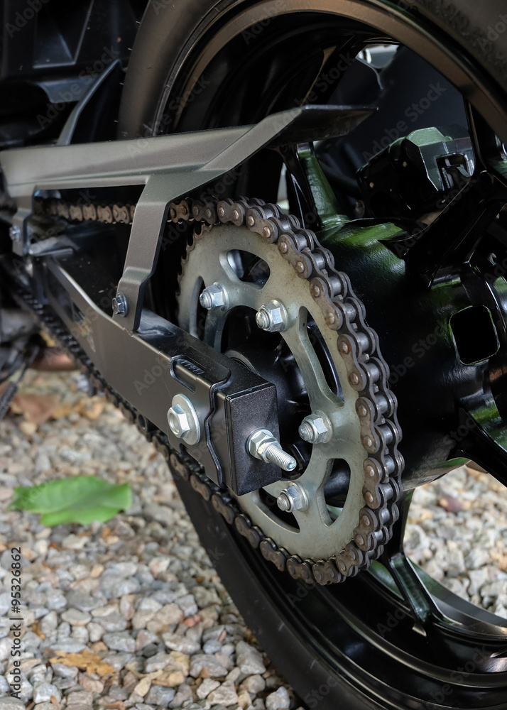 Fototapeta premium rear chain and sprocket of motorcycle wheel