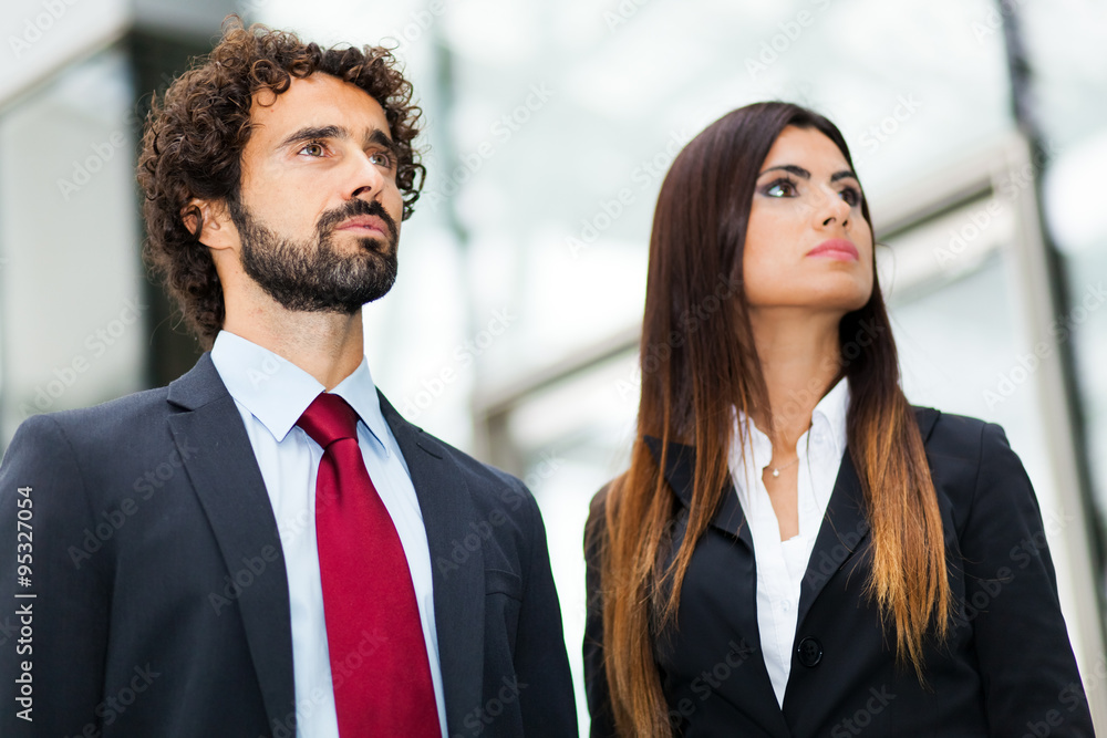 Outdoor portrait of smiling business people Outdoor portrait of smiling business people