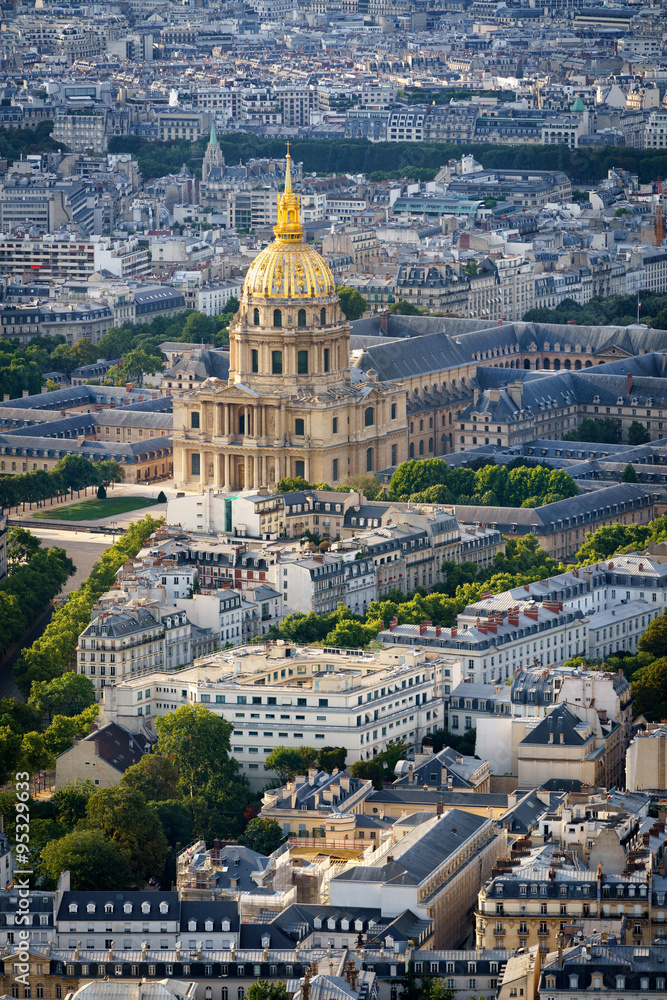 Aerial view of gold dome of the Invalides rising above rooftops of the 7th arrondissement, on the Left Bank of Paris, France