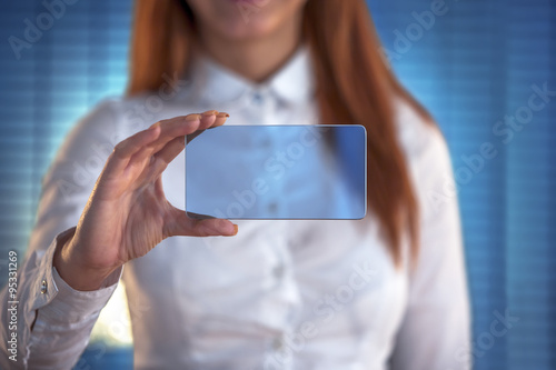 Businesswoman working with touch screen photo