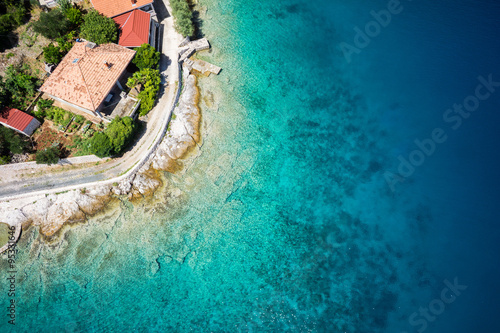 Sea shore and building roof at sunny day