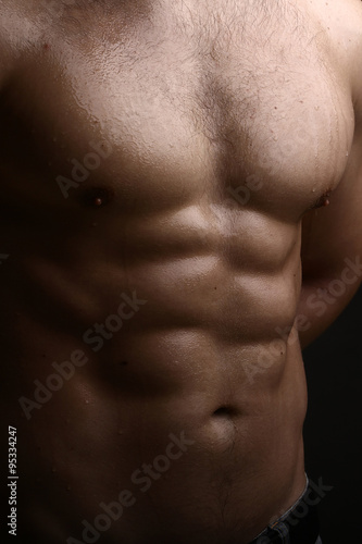 Muscular male wet torso