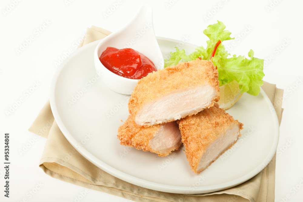 Fried chicken meat in breadcrumbs