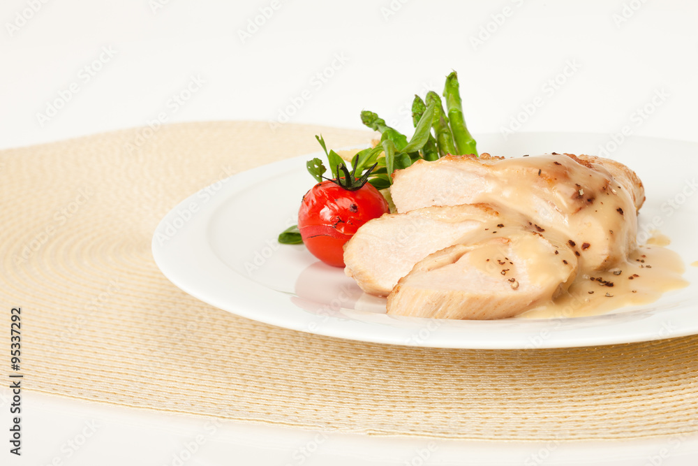 Fried chicken fillet in white cream sauce Fried chicken fillet in white cream sauce