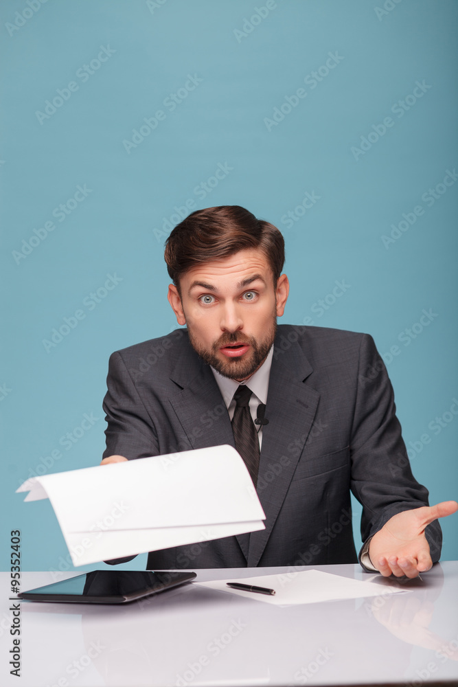 Professional young newscaster is at a loss Professional young newscaster is at a loss