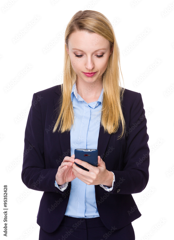 Caucasian Businesswoman use of the cellphone Caucasian Businesswoman use of the cellphone