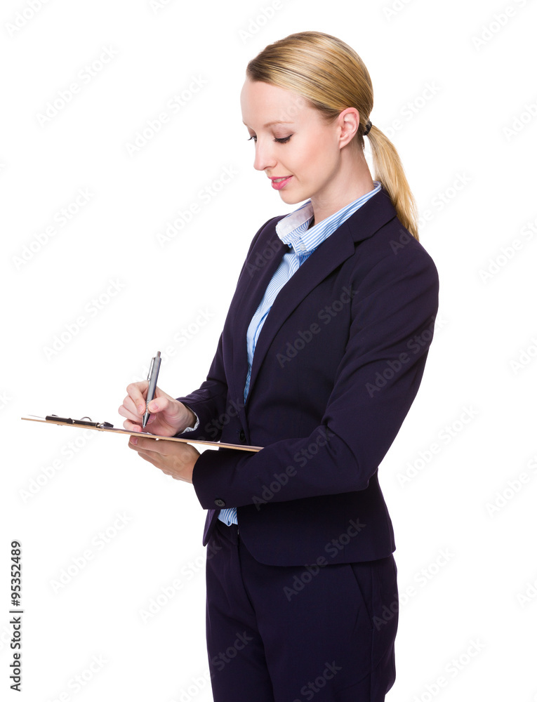 Caucasian Young Businesswoman write on clipboard