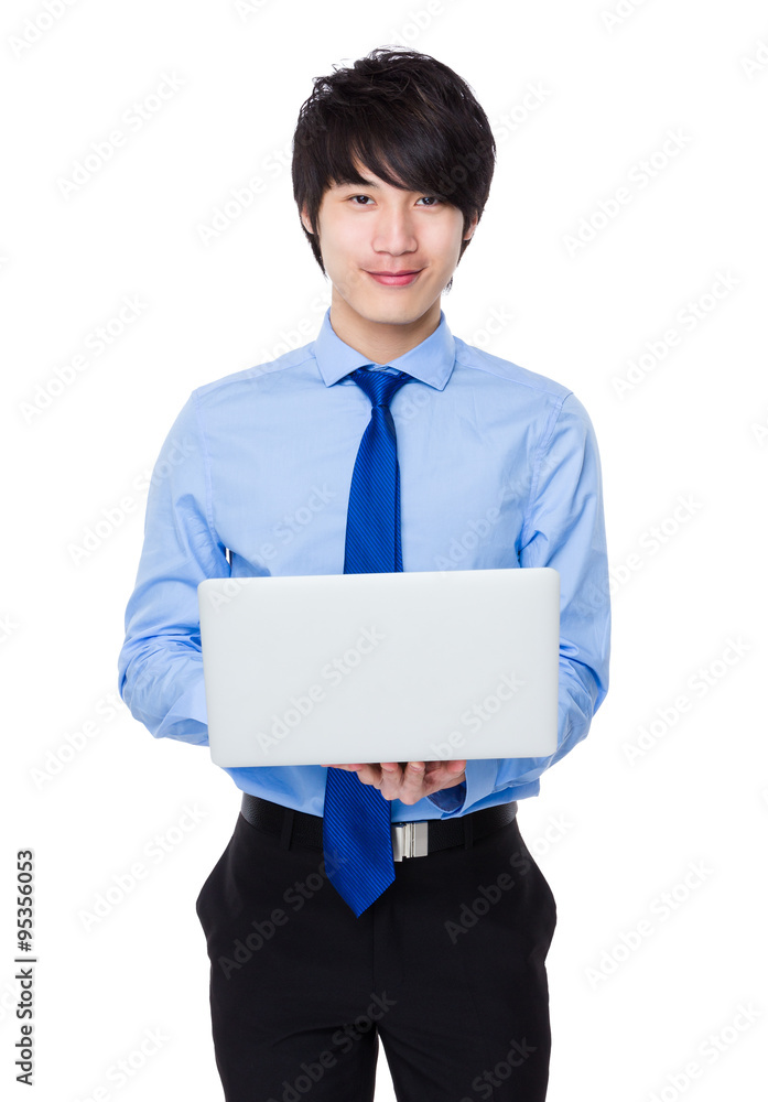 Young Businessman use of the laptop computer Young Businessman use of the laptop computer