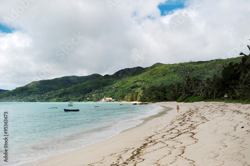 tropical beach with a boat