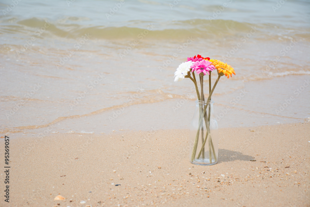 Artificial flowers on the beautiful beach