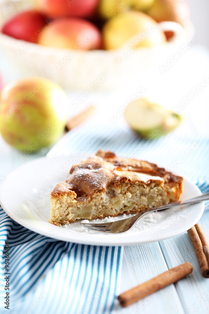 Homemade apple cake on blue wooden table