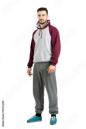 фотографія Young bearded male in sport casual clothes smiling looking at camera