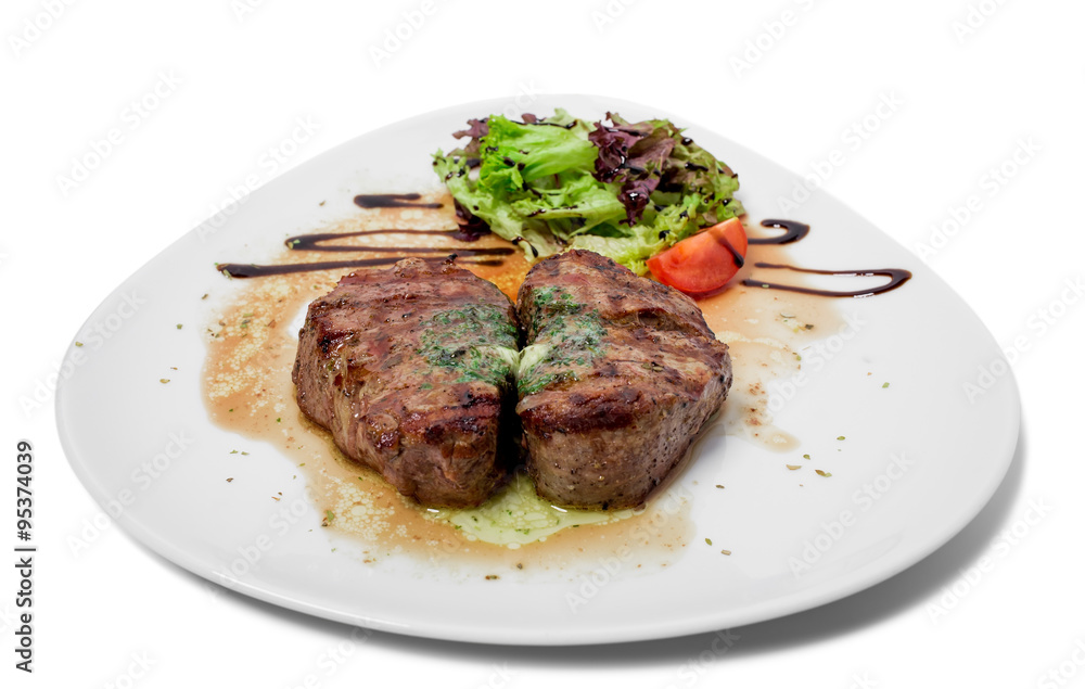 Grilled steak with green butter.