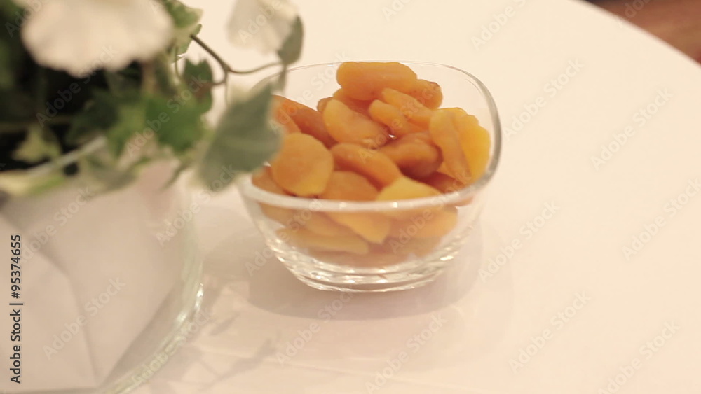 Dried apricots lies on a plate Dried apricots lies on a plate