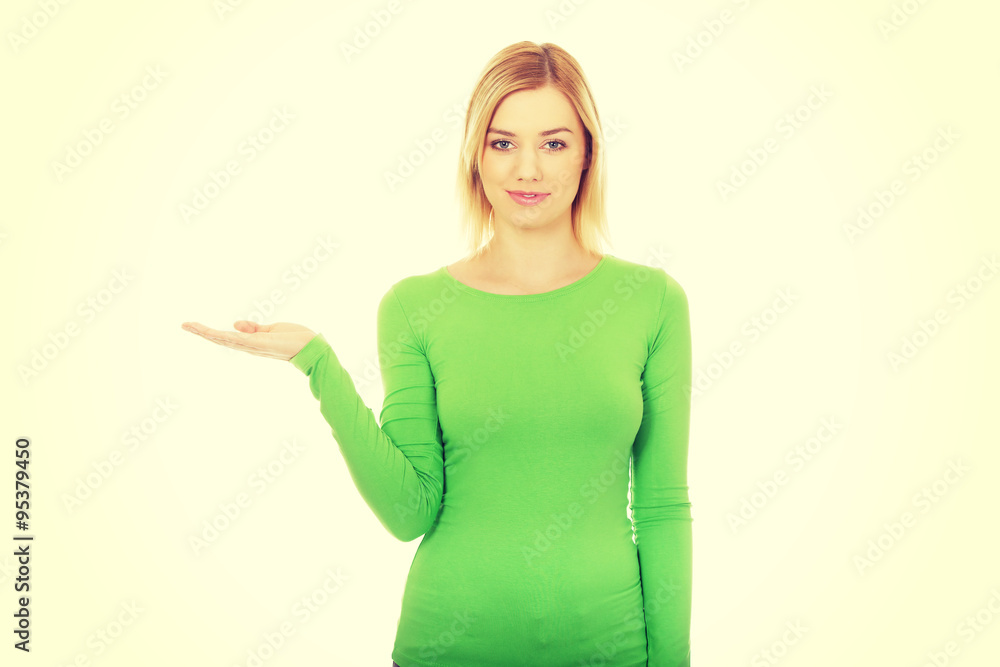 Young woman with open hand. Young woman with open hand.