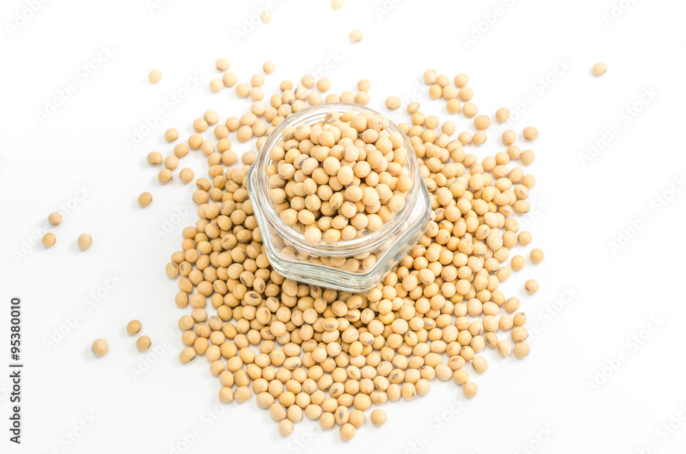 soybeans in glass jar on white background.. soybeans in glass jar on white background..