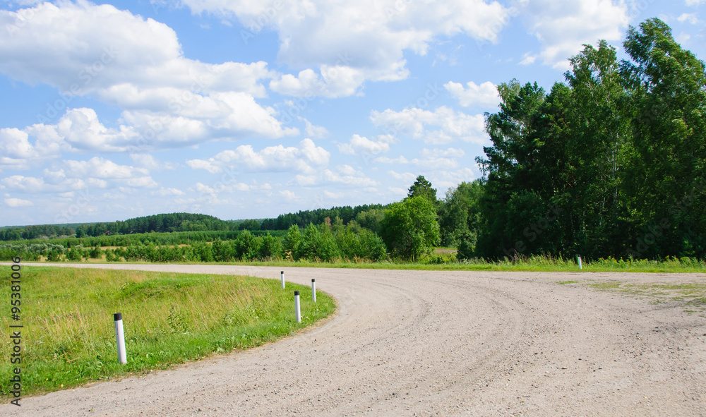 Turn of the lonely road in countryside