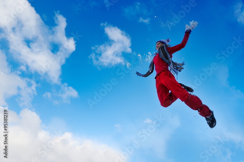young woman jumping outdoor