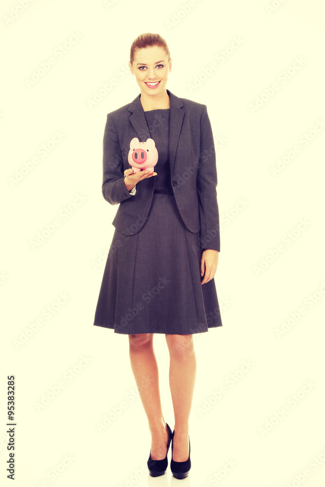 Business woman with piggybank. Business woman with piggybank.
