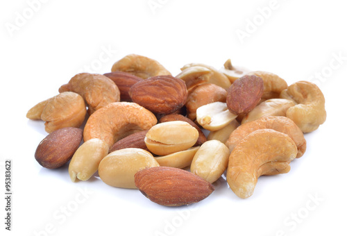 background of mixed nuts - hazelnuts, walnuts, almonds, pine nut