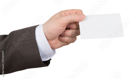Mans hand holding edge of empty paper