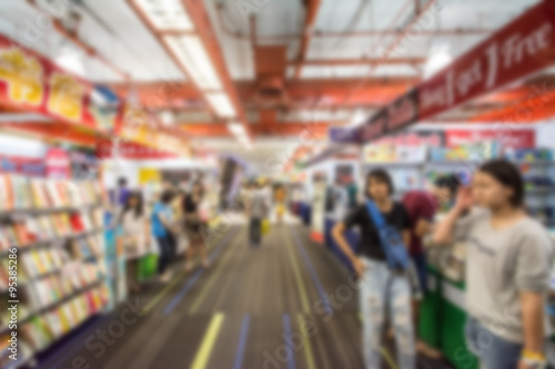 Abstract people walking in exhibition blurred background