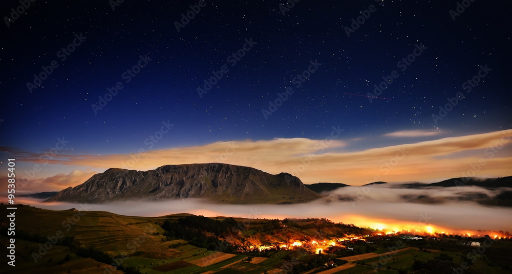 beautiful mountain landscape in foggy morning in Alba, Romania