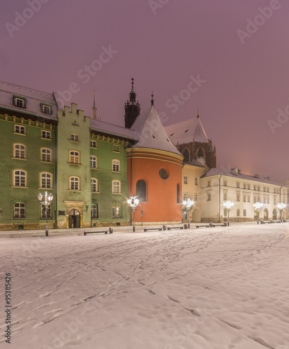 Small market square (Maly Rynek) in Krakow, Poland, on a winter night #95385426
