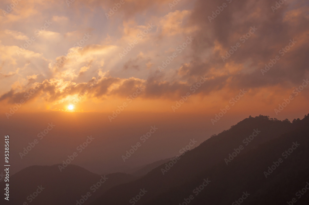 Sunrise silhouette mountains layer