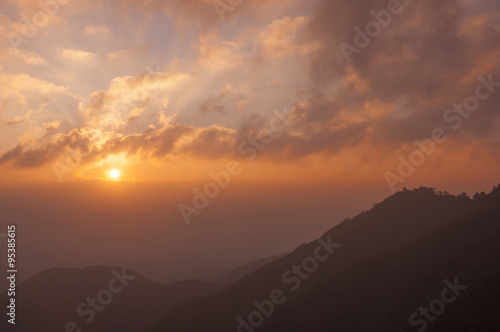 Sunrise silhouette mountains layer © canjoena