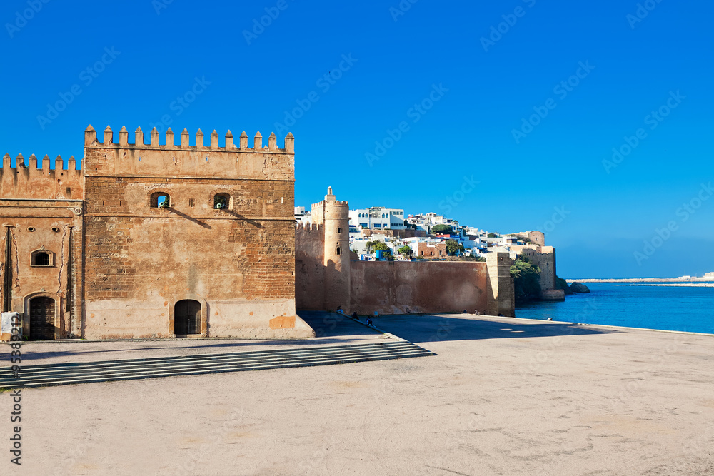 Fortress guarding river estuary and historical Medina of city of