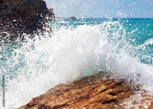 wave and splashes on beach of cathedrals in ribadeo, Galicia, Sp