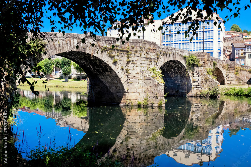 old Roman bridge in Monforte de Lemos, Galicia, Spain