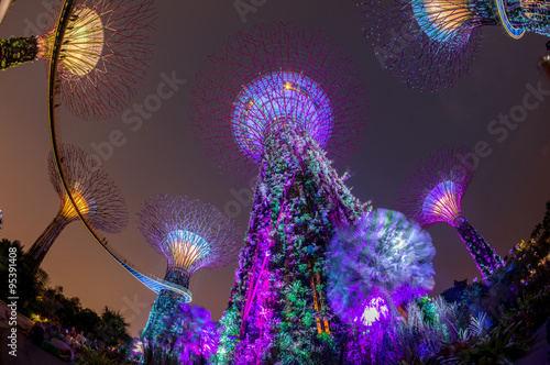 SINGAPORE - JUNE 26: Night view of Supertree Grove at Gardens by the Bay on JUNE 26, 2014 in Singapore. Spanning 101 hectares of reclaimed land in central Singapore, adjacent to the Marina Reservoir.