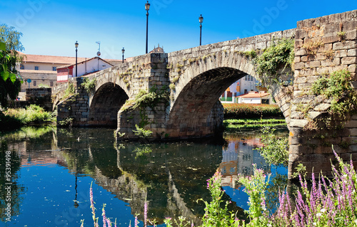 old Roman bridge in Monforte de Lemos, Galicia, Spain