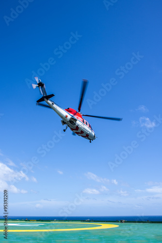 Helicopter take off from oil rig