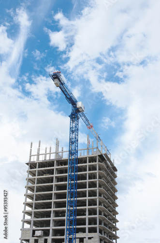 Construction crane and concrete building construction