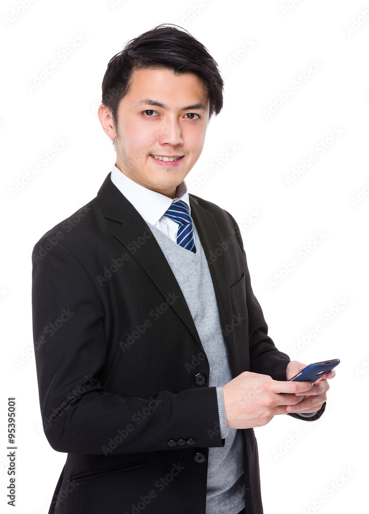 Asian Businessman use of the mobile phone Asian Businessman use of the mobile phone