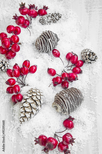 Christmas Decoration with Red Berries and Pine Cones