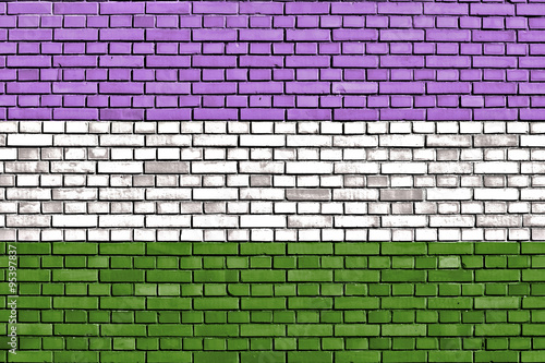 Genderqueer pride flag painted on brick wall photo