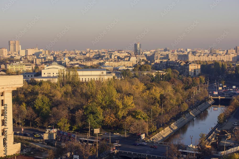 Fototapeta premium Bucharest , Romania - November 4, 2015 – Bucharest, the capital of Romania - view from above, over Dimbovita river at sunset.