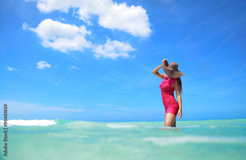 Carefree young woman enjoying clear water of the carribean sea Carefree young woman enjoying clear water of the carribean sea