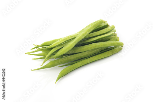 Fresh green cluster beans on white background shot in studio.