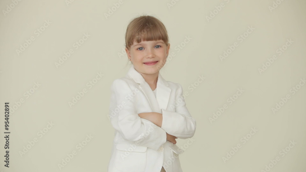 Little businesswoman folded her hands and smiling Little businesswoman folded her hands and smiling