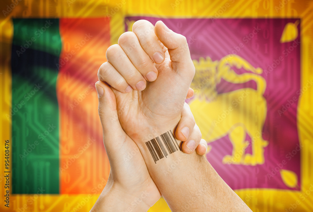 Barcode ID number on wrist and national flag on background - Sri Lanka
