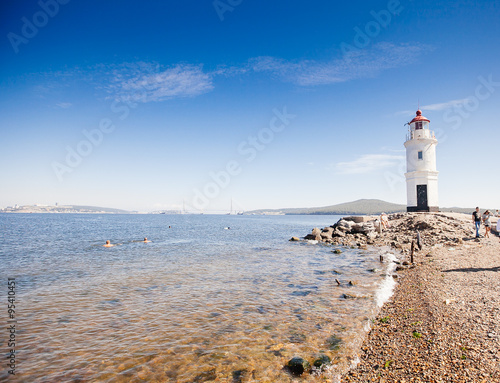 Lighthouse Tokarevskaya koshka with vane anemometer in Vladivost photo