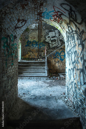Fototapeta Naklejka Na Ścianę i Meble -  Old abandoned building with graffiti on the walls