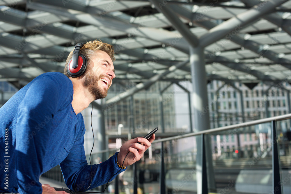 Cool guy laughing with headphones Cool guy laughing with headphones