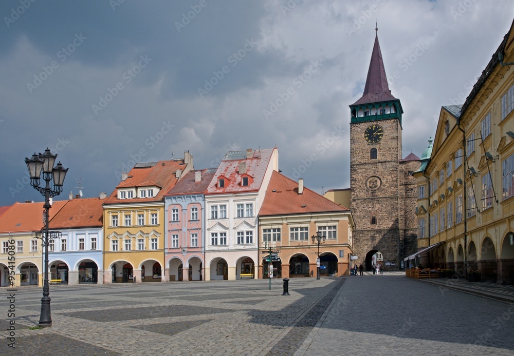 Square with historic houses and Valdicka gate in Jicin, Cesky Raj, Czech republic