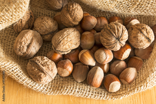Walnuts and hazelnuts in a jute sack
